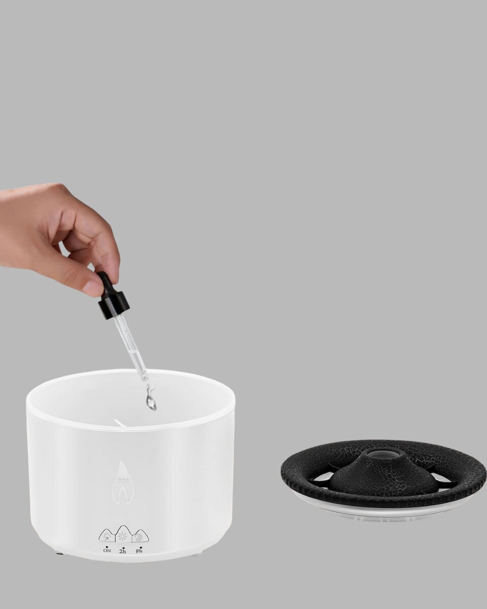 Alev Efektli Buhar Makinesi – Aromaterapi, Nemlendirme ve Işık Modlu Tasarım Alev Efektli Buhar Makinesi – Aromaterapi, Nemlendirme ve Işık Modlu Tasarım